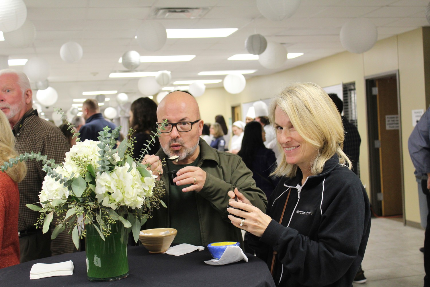 Guests sample the array of gourmet soups at the SOUPer Bowl at Nease High School. This year’s event is Jan. 31, from 6 to 8 p.m. at Nease. Tickets are $25 at studentstacklehunger.org.